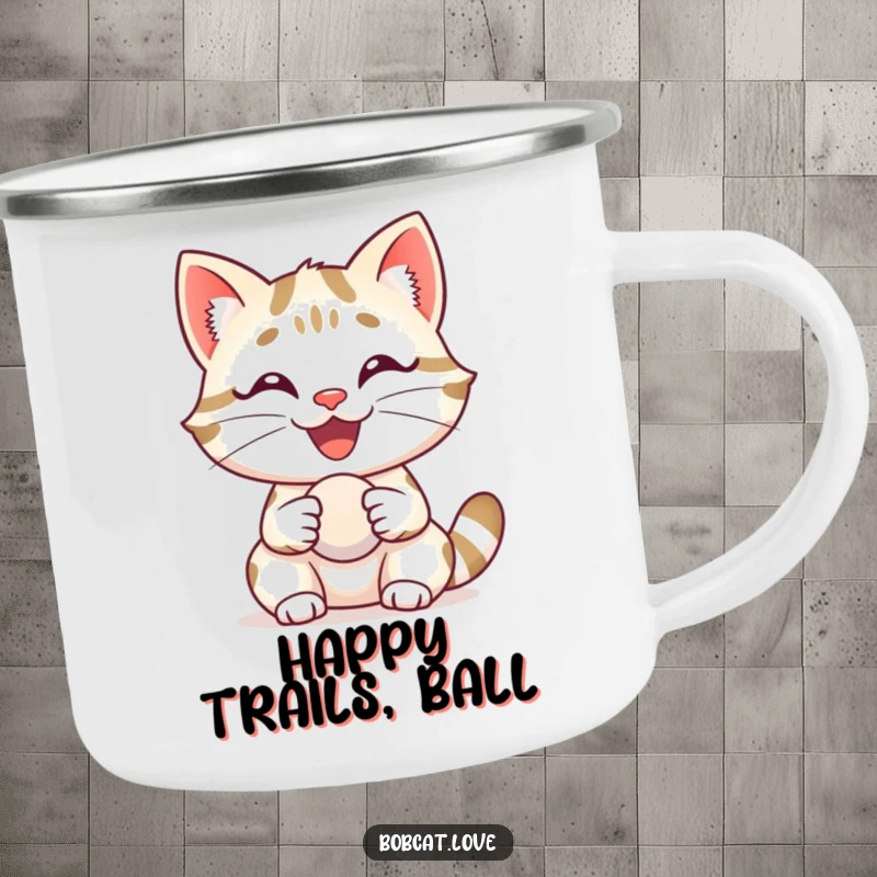 Funny bobcat with a big, happy grin, delightedly holding a small ball, designed on a durable camping mug.