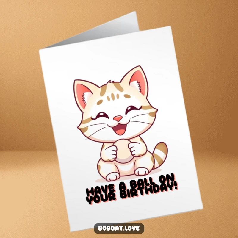 Funny Free Printable Birthday Card: A delighted bobcat with a huge grin, holding a small ball, radiating happiness and birthday cheer.